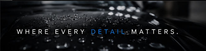 Water beading on a freshly detailed vehicle surface